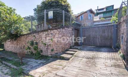 Casa com 4 quartos à venda na Rua Dona Lida Monteiro, 410, Teresópolis, Porto Alegre, 280 m2 por R$ 1.200.000