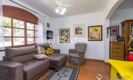 Casa em condomínio fechado com 4 quartos à venda na Rua Doutor Campos Velho, 1245, Cristal, Porto Alegre, 300 m2 por R$ 750.000