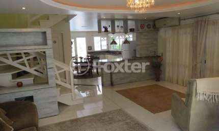 Casa em condomínio fechado com 3 quartos à venda na Rua José Henrique Barbosa dos Santos, 240, Dom Feliciano, Gravataí, 262 m2 por R$ 1.100.000