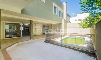 Casa em condomínio fechado com 3 quartos à venda na Rua Tocantins, 540, Agronomia, Porto Alegre, 396 m2 por R$ 1.662.500