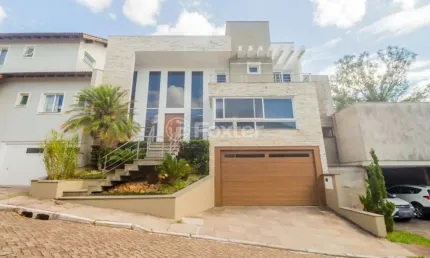 Casa em condomínio fechado com 3 quartos à venda na Rua Tocantins, 540, Agronomia, Porto Alegre, 396 m2 por R$ 1.300.000