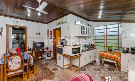 Casa com 3 quartos à venda na Rua Dezenove de Abril, 109, Jardim Itu Sabará, Porto Alegre, 247 m2 por R$ 490.000