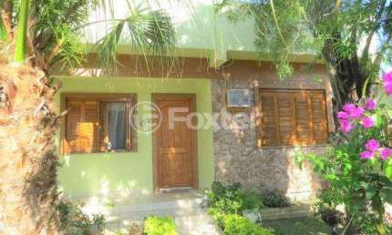 Casa com 4 quartos à venda na Rua Doutor Carlos de Moura e Cunha, 172, Centro, Guaíba, 190 m2 por R$ 780.000