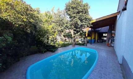 Casa com 4 quartos à venda na Rua Osvaldo Aranha, 236, Formoza, Alvorada, 177 m2 por R$ 400.000