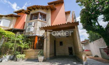 Casa com 3 quartos à venda na Rua Criciúma, 345, Guarujá, Porto Alegre, 147 m2 por R$ 565.000