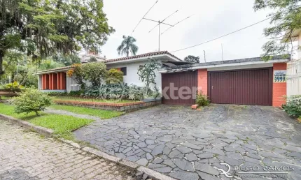 Casa com 4 quartos à venda na Travessa Trindade, 10, Jardim Lindóia, Porto Alegre, 252 m2 por R$ 1.080.000