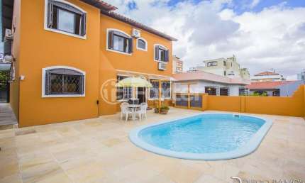Casa com 3 quartos à venda na Rua Inhanduí, 340, Cristal, Porto Alegre, 204 m2 por R$ 1.277.000