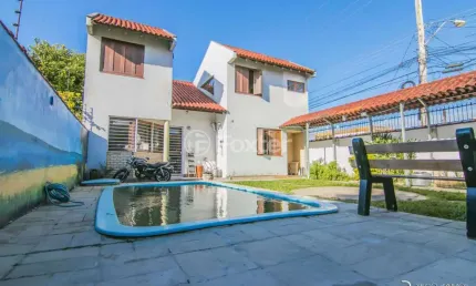 Casa com 3 quartos à venda na Rua Padre João Batista Reus, 2268, Tristeza, Porto Alegre, 255 m2 por R$ 1.270.000