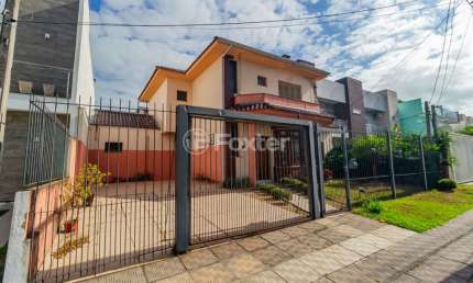 Casa em condomínio fechado com 5 quartos à venda na Rua Eroni Soares Machado, 104, Hípica, Porto Alegre, 234 m2 por R$ 1.100.000