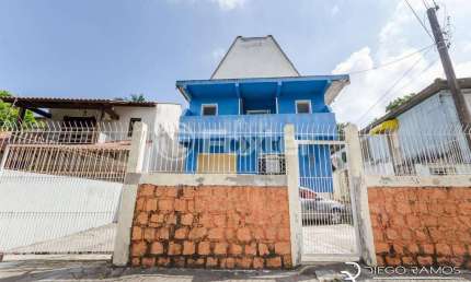 Casa comercial com 1 sala à venda na Rua Octávio de Souza, 995, Nonoai, Porto Alegre, 279 m2 por R$ 510.000