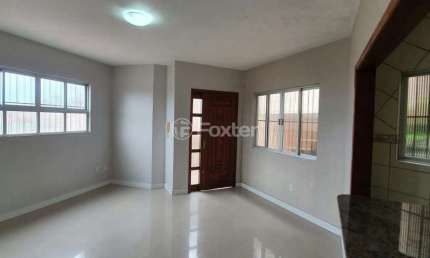 Casa com 3 quartos à venda na Rua Ângelo Passuelo, 220/230, Vila Nova, Porto Alegre, 350 m2 por R$ 795.000