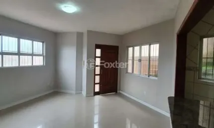 Casa com 3 quartos à venda na Rua Ângelo Passuelo, 220/230, Vila Nova, Porto Alegre, 350 m2 por R$ 795.000