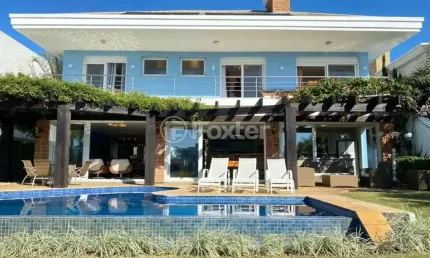 Casa em condomínio fechado com 5 quartos à venda na Avenida Central, 2500, Atlântida, Xangri-Lá, 400 m2 por R$ 4.560.000