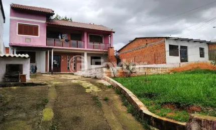 Casa com 3 quartos à venda na Avenida Garcia Lorca, 94, Parque Santo Inácio, Esteio, 151 m2 por R$ 340.000