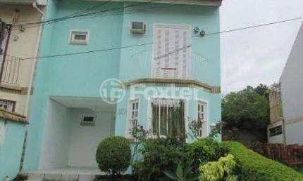 Casa em condomínio fechado com 3 quartos à venda na Rua Osório Mendes Ouriques, 332, Guarujá, Porto Alegre, 165 m2 por R$ 498.000