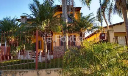 Casa com 4 quartos à venda na Rua Carazinho, 100, Cocão, Viamão, 134 m2 por R$ 500.000
