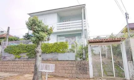 Casa com 2 quartos à venda na Rua Mathilde Zatar, 157, Nonoai, Porto Alegre, 135 m2 por R$ 617.000