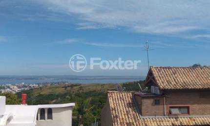 Casa com 3 quartos à venda na Rua Dona Lida Monteiro, 215, Teresópolis, Porto Alegre, 309 m2 por R$ 755.000