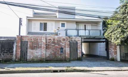 Casa com 6 quartos à venda na Rua Arapei, 228, Cristal, Porto Alegre, 500 m2 por R$ 1.200.000