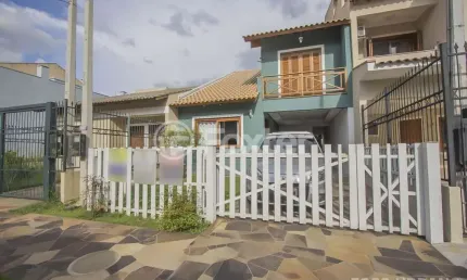 Casa em condomínio fechado com 3 quartos à venda na Rua Pau-Brasil, 412, Hípica, Porto Alegre, 140 m2 por R$ 636.000