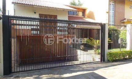 Casa com 3 quartos à venda na Rua Doutor Mário Totta, 1440, Tristeza, Porto Alegre, 287 m2 por R$ 1.250.000