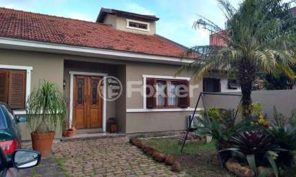 Casa com 3 quartos à venda na Rua Jayme Saul de Borba, 40, Guarujá, Porto Alegre, 157 m2 por R$ 650.000