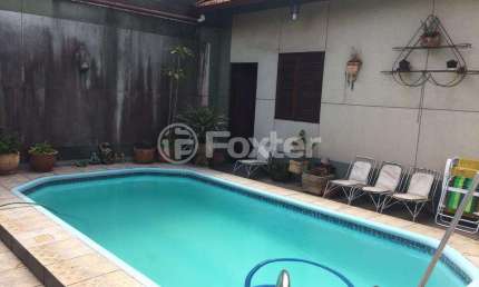 Casa com 4 quartos à venda na Avenida Guido Mondin, 424/430, São Geraldo, Porto Alegre, 308 m2 por R$ 930.000