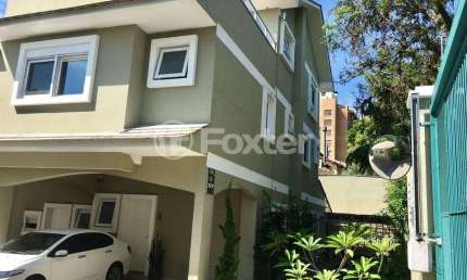 Casa em condomínio fechado com 3 quartos à venda na Rua Doutor Mário Totta, 382, Tristeza, Porto Alegre, 274 m2 por R$ 1.900.000