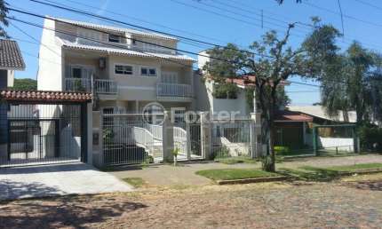 Casa com 3 quartos à venda na Rua Martin Luther King, 131, São Sebastião, Porto Alegre, 232 m2 por R$ 780.000