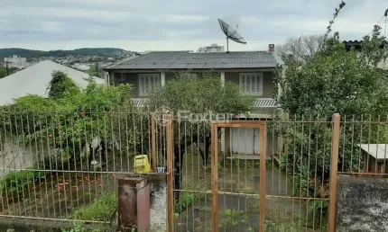 Casa com 2 quartos à venda na Avenida Vicente Monteggia, 583, Cavalhada, Porto Alegre, 100 m2 por R$ 480.000