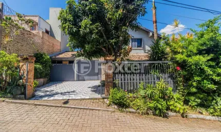 Casa em condomínio fechado com 3 quartos à venda na Estrada João Passuelo, 1060, Vila Nova, Porto Alegre, 192 m2 por R$ 720.000
