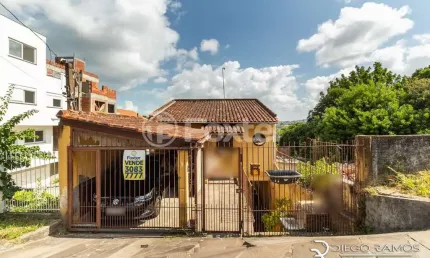 Casa com 4 quartos à venda na Rua Padre João Batista Reus, 2778, Camaquã, Porto Alegre, 163 m2 por R$ 420.000