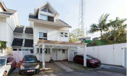 Casa em condomínio fechado com 3 quartos à venda na Rua Tocantins, 1120C, Lomba do Pinheiro, Porto Alegre, 149 m2 por R$ 1.030.000