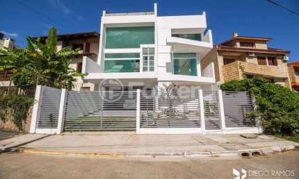 Casa em condomínio fechado com 3 quartos à venda na Rua Alcebíades Antônio dos Santos, 605, Nonoai, Porto Alegre, 311 m2 por R$ 1.605.500