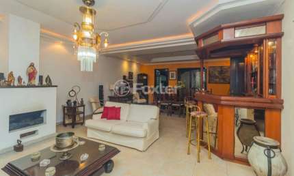 Casa com 4 quartos à venda na Rua Gustavo Schmidt, 305, Três Figueiras, Porto Alegre, 380 m2 por R$ 1.750.000
