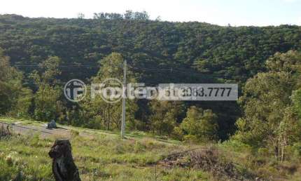 Terreno em condomínio fechado à venda na Avenida Liberdade, 3500, Santa Isabel, Viamão, 1000 m2 por R$ 250.000