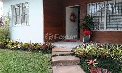 Casa com 4 quartos à venda na Rua Dezessete de Junho, 2126, Morro do Leôncio, Taquara, 158 m2 por R$ 1.099.000