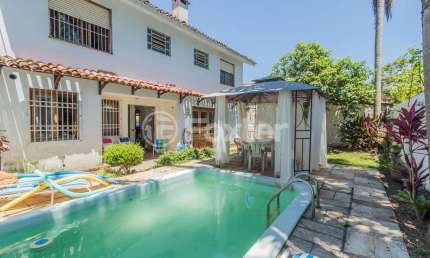 Casa com 4 quartos à venda na Rua Doutor Raul Moreira, 354, Cristal, Porto Alegre, 180 m2 por R$ 950.000