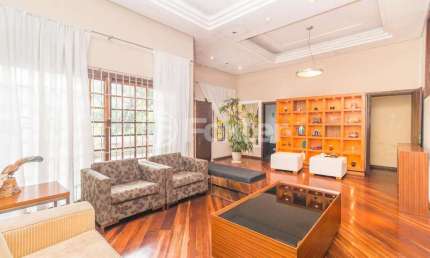 Casa com 4 quartos à venda na Avenida Fábio Araújo Santos, 1472, Nonoai, Porto Alegre, 353 m2 por R$ 874.000