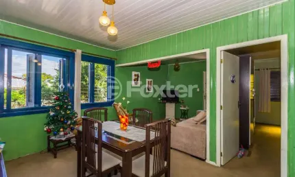 Casa com 3 quartos à venda na Rua Ibirubá, 104, Cavalhada, Porto Alegre, 170 m2 por R$ 330.000