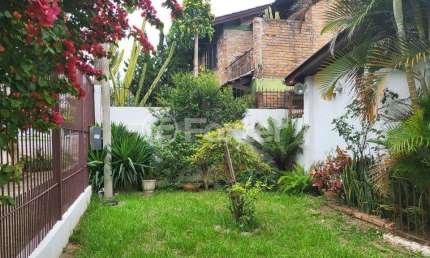 Casa com 3 quartos à venda na Rua Francisco Braga, 32, Partenon, Porto Alegre, 210 m2 por R$ 650.000