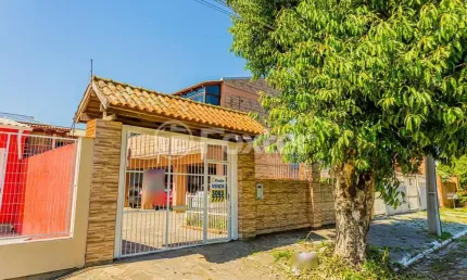 Casa com 4 quartos à venda na Rua Vereador Alcides Nascimento, 462, Rio Branco, Canoas, 137 m2 por R$ 608.000