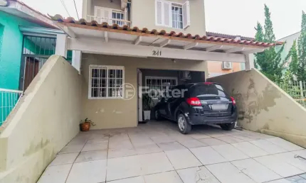 Casa com 3 quartos à venda na Rua Eliza Tevah, 241, Hípica, Porto Alegre, 115 m2 por R$ 349.000