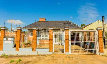 Casa com 4 quartos à venda na Rua Doutor Paulino Guerra, 505, Jardim Itu Sabará, Porto Alegre, 168 m2 por R$ 650.000