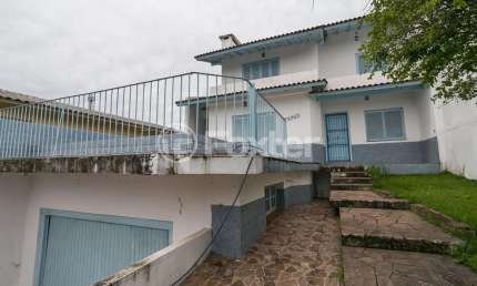 Casa com 4 quartos à venda na Rua Padre João Batista Reus, 1767, Vila Conceição, Porto Alegre, 266 m2 por R$ 650.000