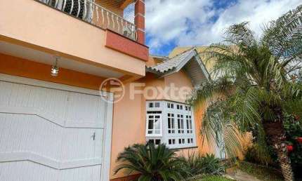 Casa com 4 quartos à venda na Rua da Alegria, 136, Estância Velha, Canoas, 194 m2 por R$ 948.000