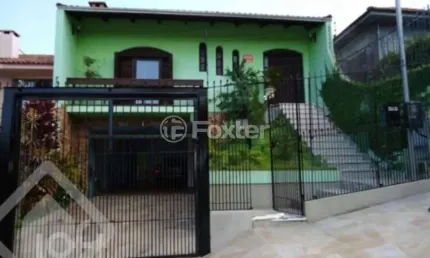 Casa com 4 quartos à venda na Rua Hipólito da Costa, 63, Santa Tereza, Porto Alegre, 330 m2 por R$ 800.000