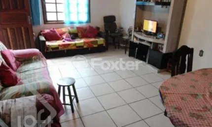 Casa com 3 quartos à venda na Rua Santo Expedito, 215, Parque Santa Fé, Porto Alegre, 660 m2 por R$ 318.000