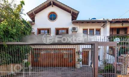 Casa com 4 quartos à venda na Rua Roque Gonzales, 126, Jardim Botânico, Porto Alegre, 300 m2 por R$ 1.499.000