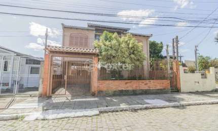 Casa com 4 quartos à venda na Travessa Davi José Estrela, 44, Sarandi, Porto Alegre, 280 m2 por R$ 630.000